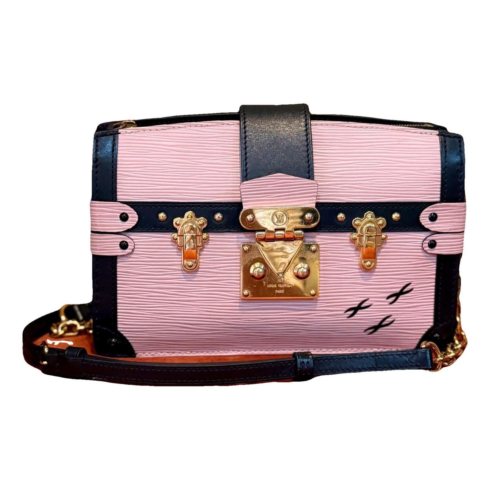 Pochette Trunk leather handbag