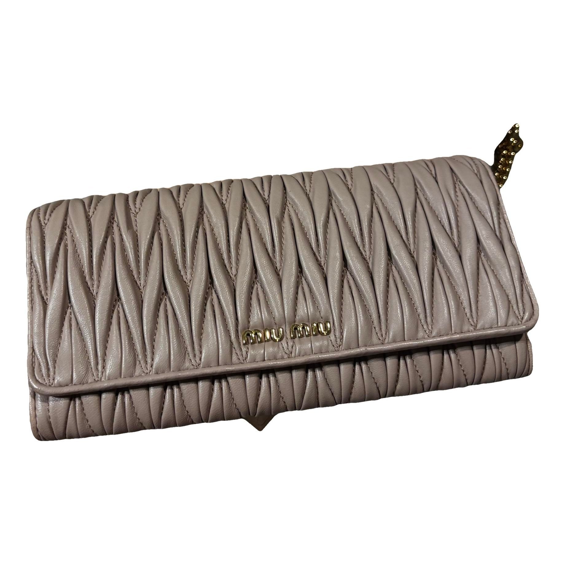 Matelassé leather clutch bag