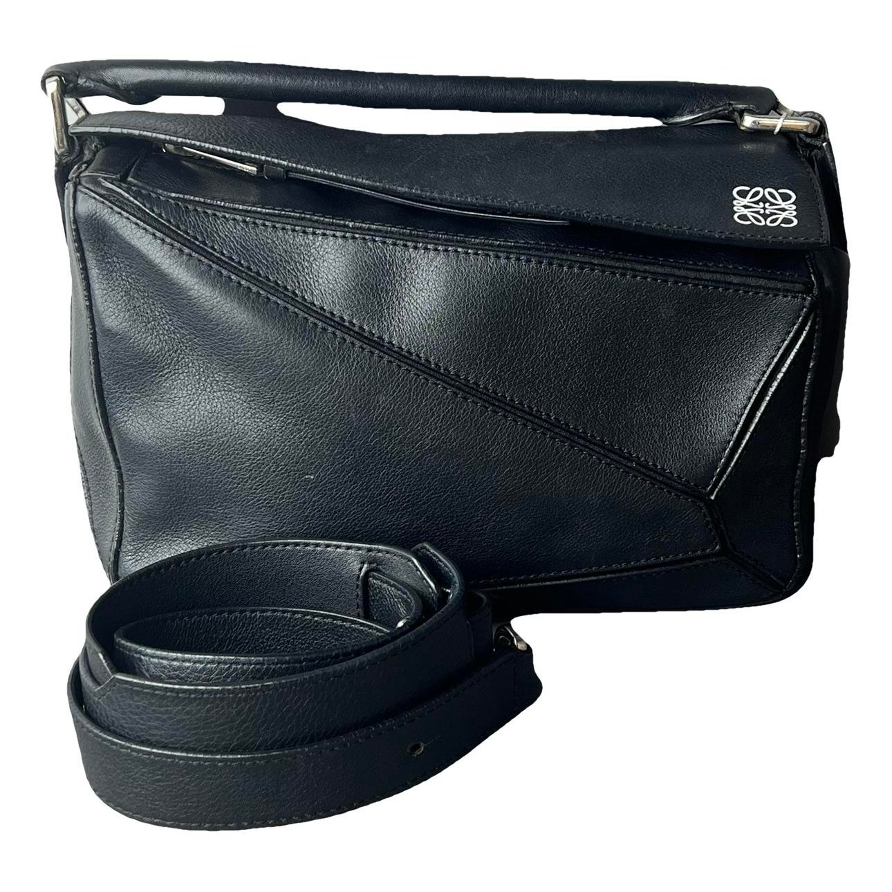 Puzzle leather handbag