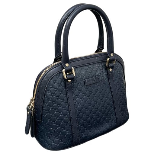 Dôme leather handbag