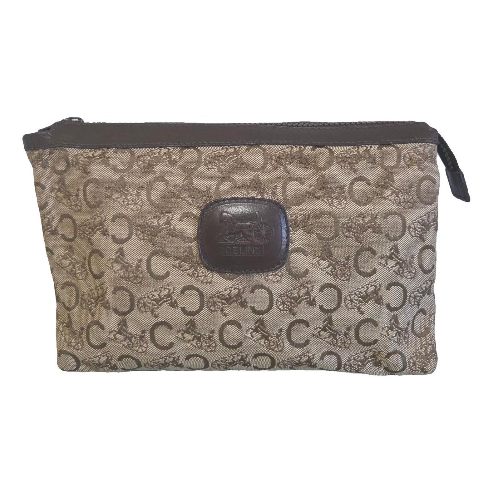 Triomphe Vintage cloth clutch bag