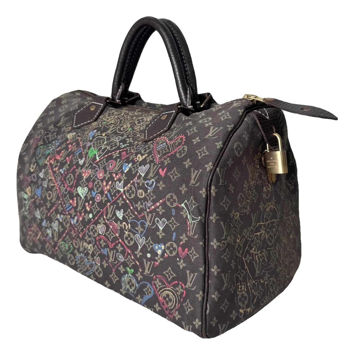 Speedy patent leather handbag