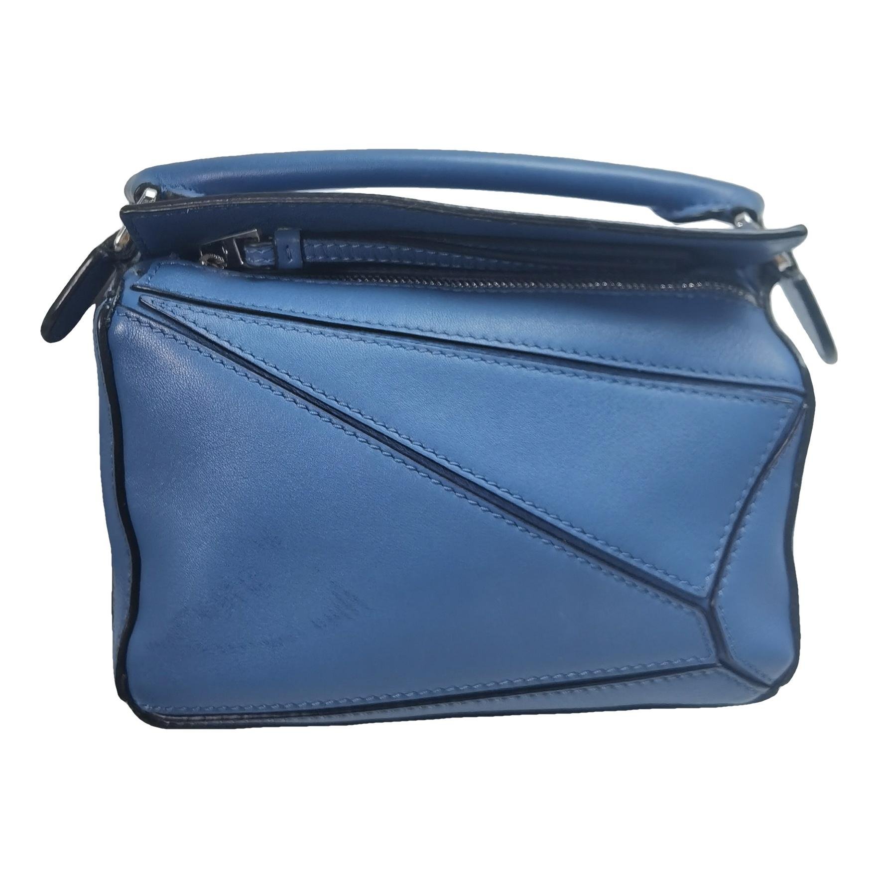 Puzzle leather handbag