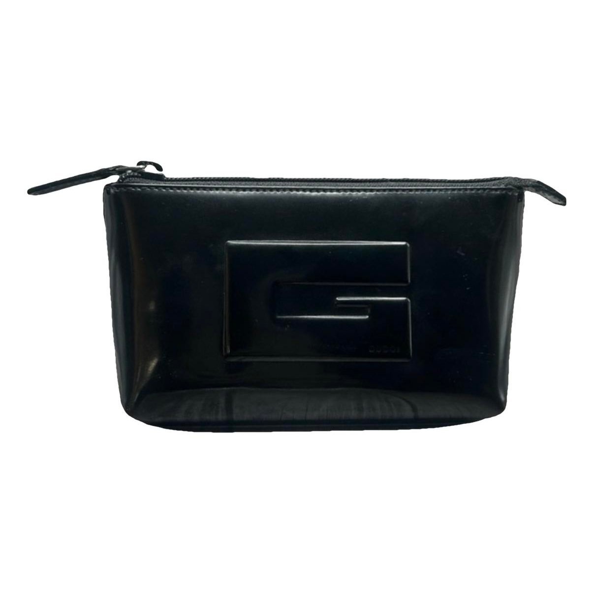Patent leather clutch bag