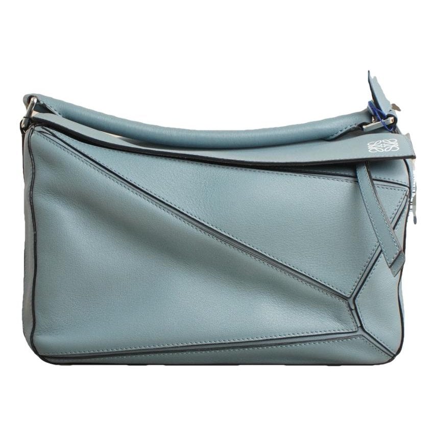 Puzzle leather handbag