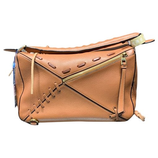 Puzzle leather handbag