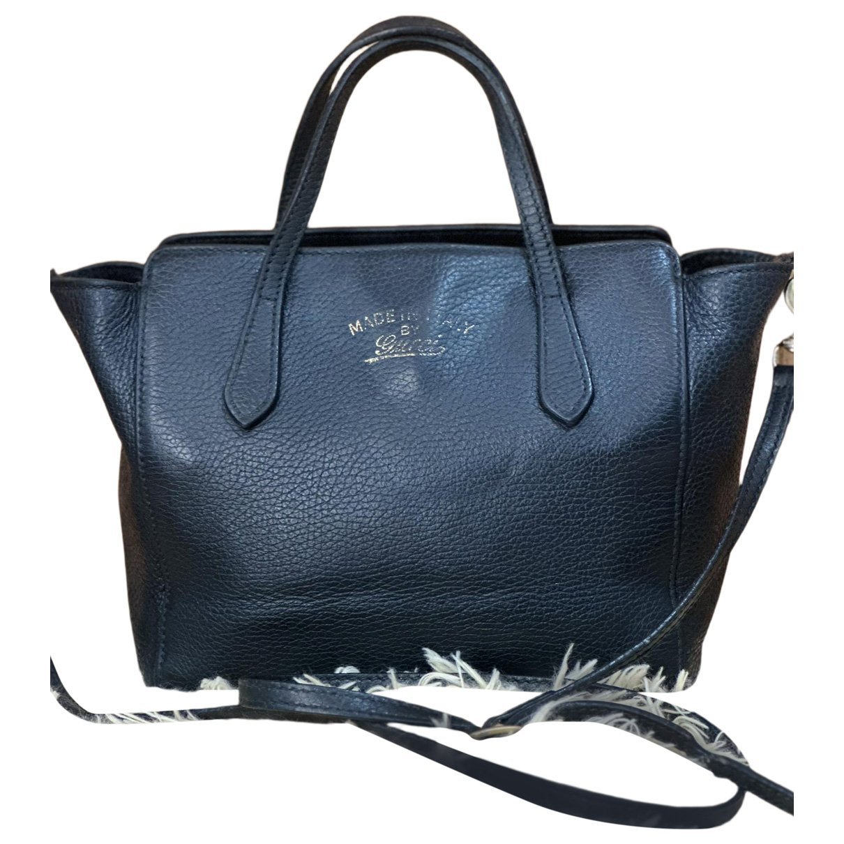 Swing leather handbag