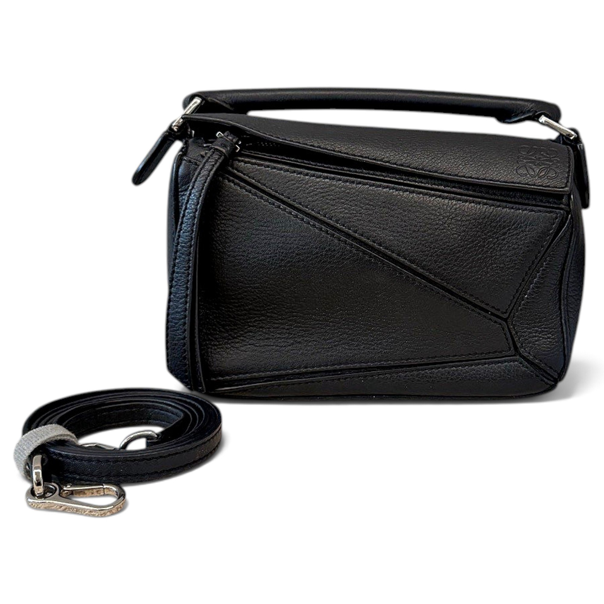 Puzzle leather handbag
