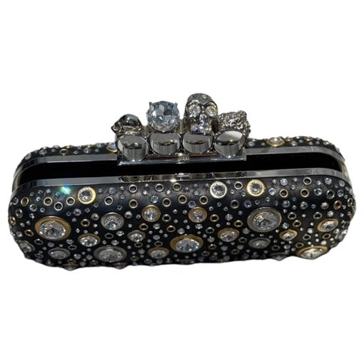 Knuckle leather clutch bag