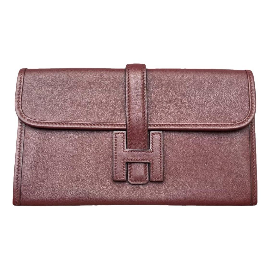 Jige leather clutch bag