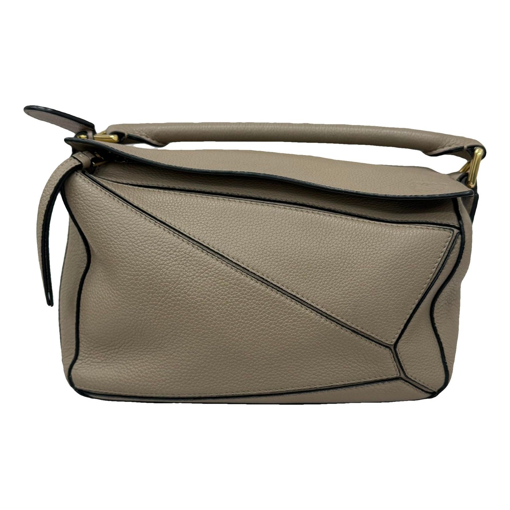 Puzzle leather handbag