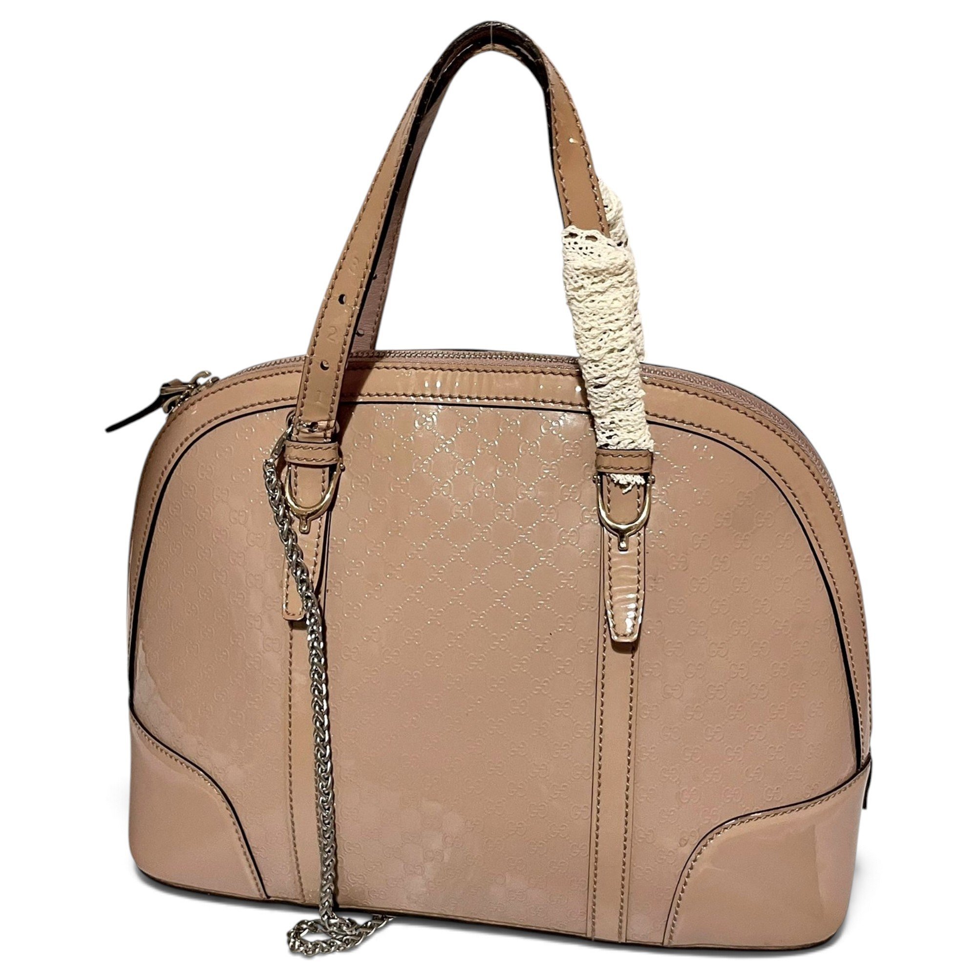 Dôme patent leather handbag