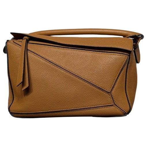 Puzzle leather handbag