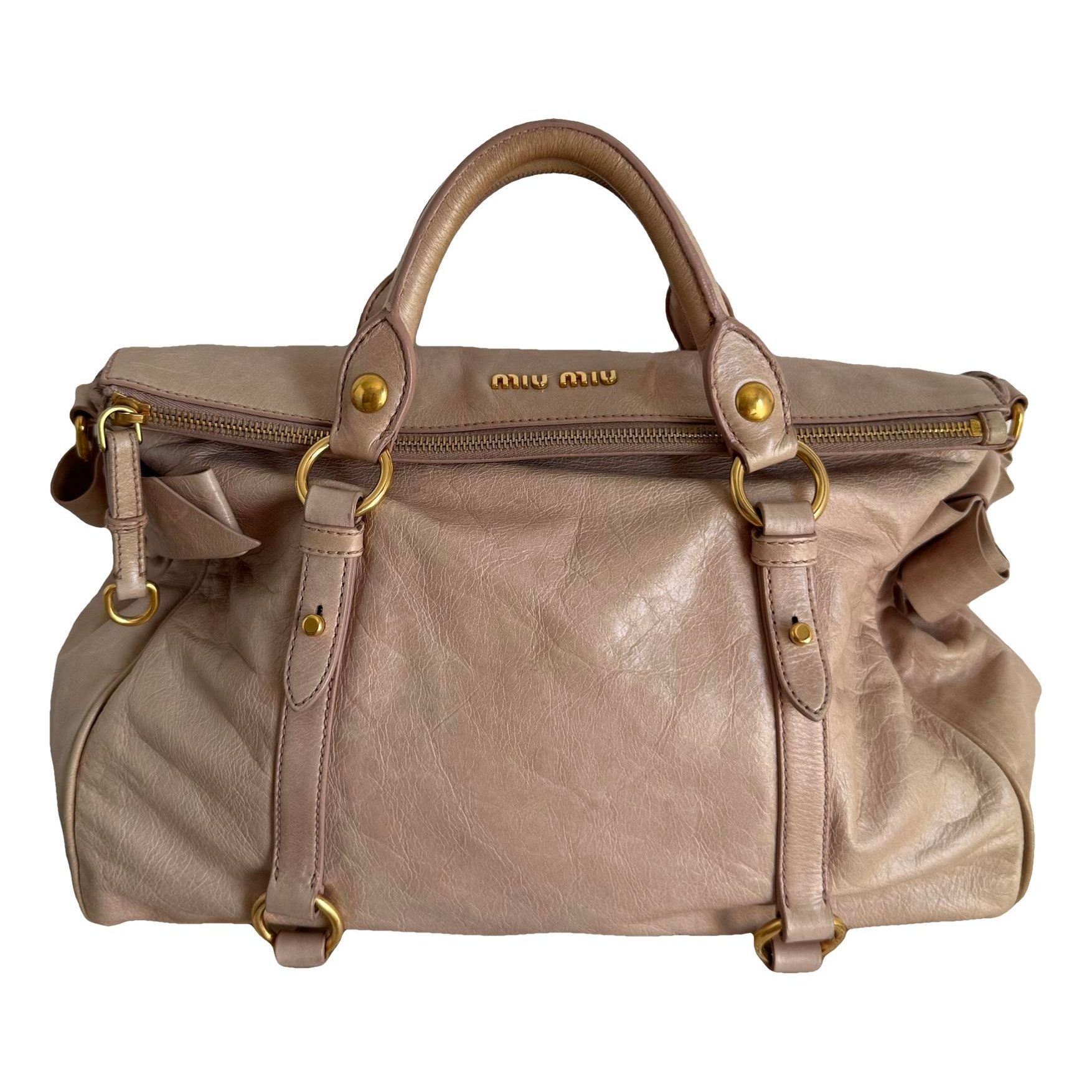 Bow bag leather handbag