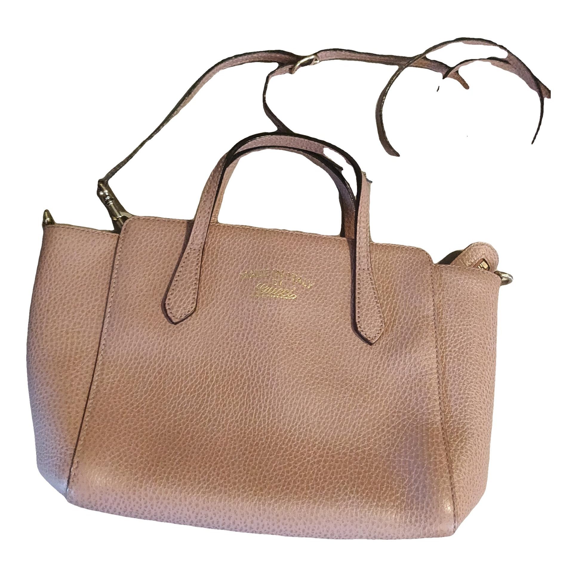 Swing leather handbag