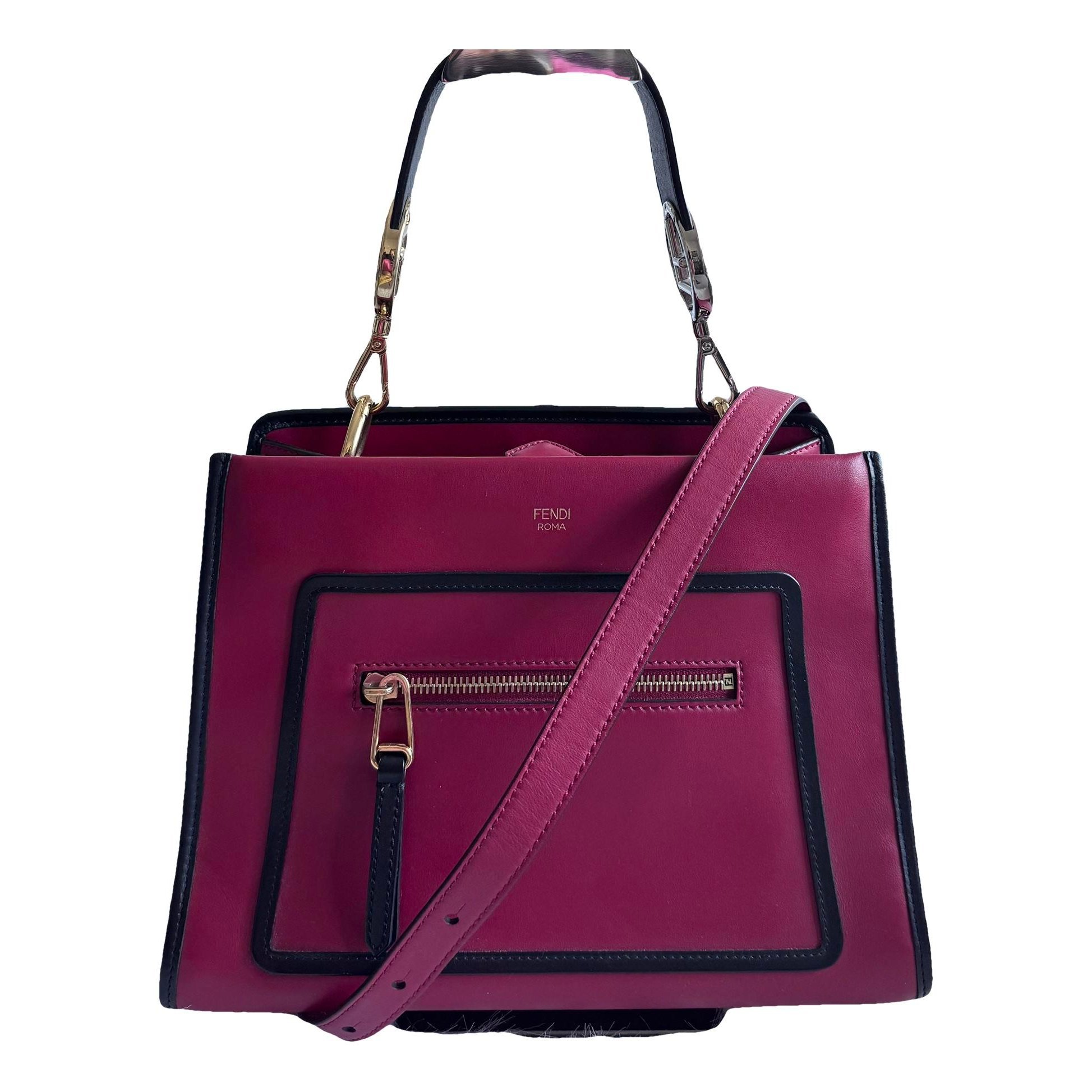 Runaway leather handbag