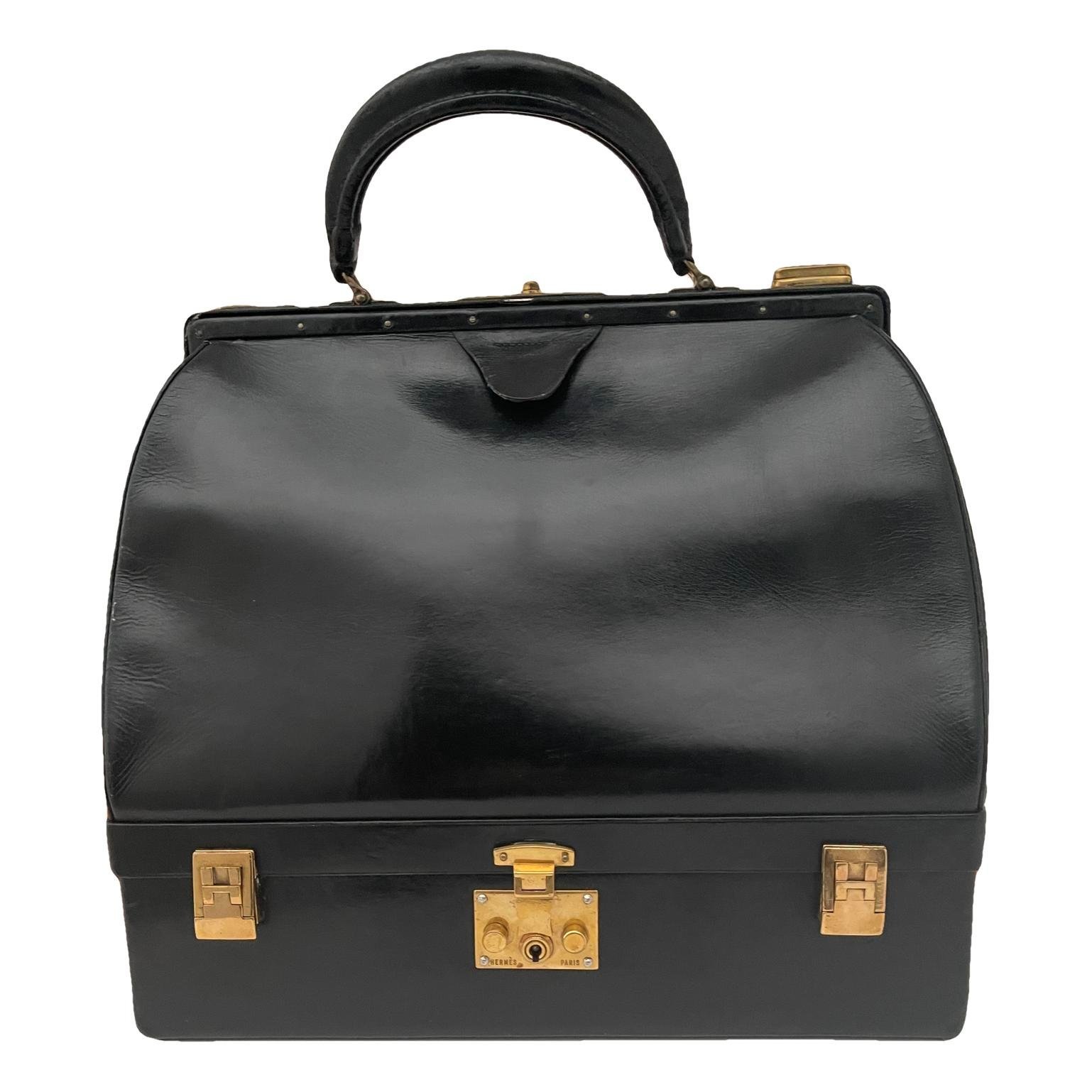 Malette leather handbag