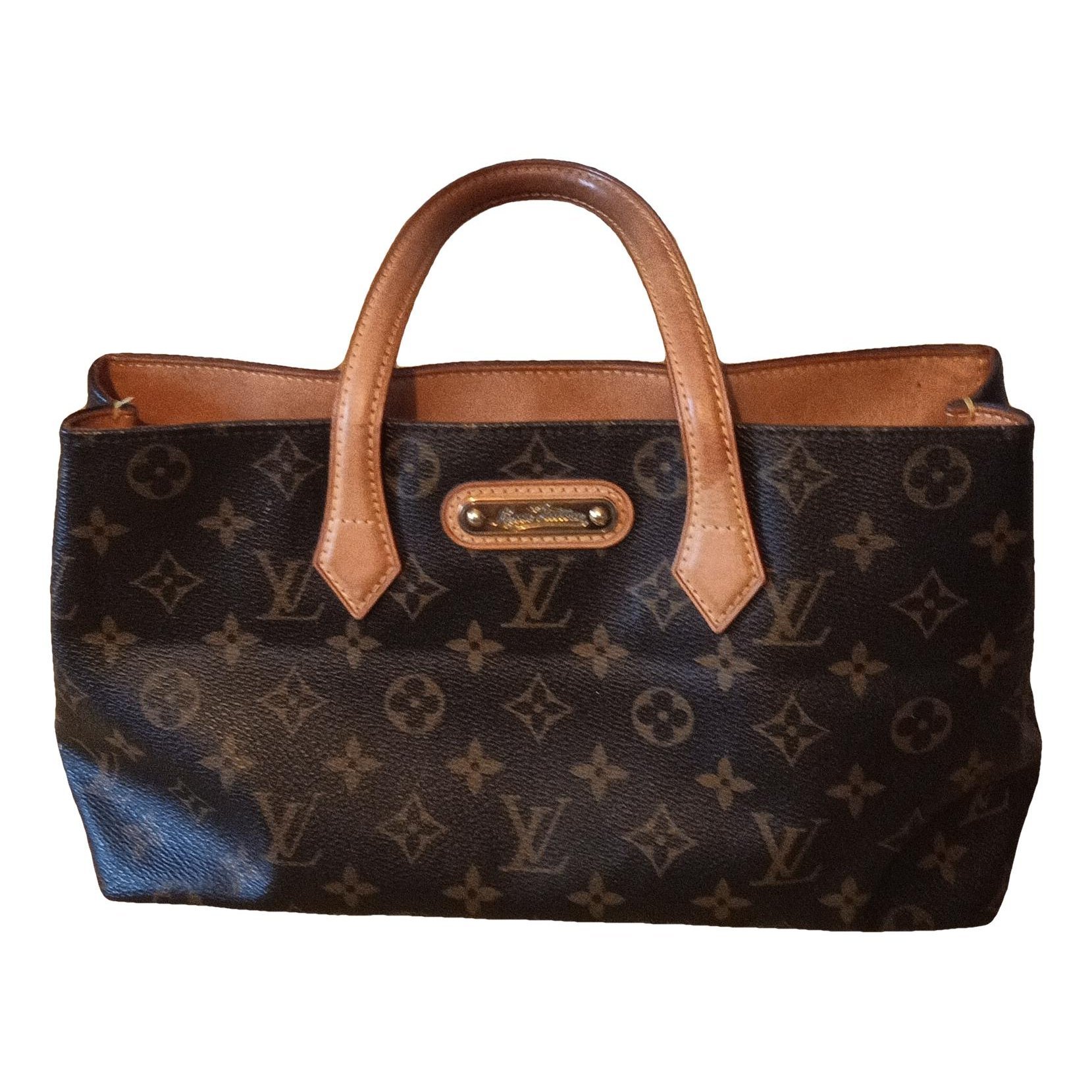Louis Vuitton Cite leather mini bag