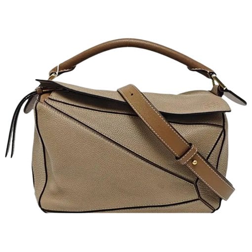 Puzzle leather handbag
