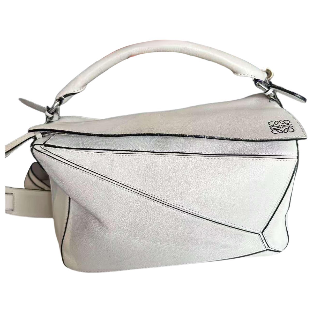 Puzzle leather handbag