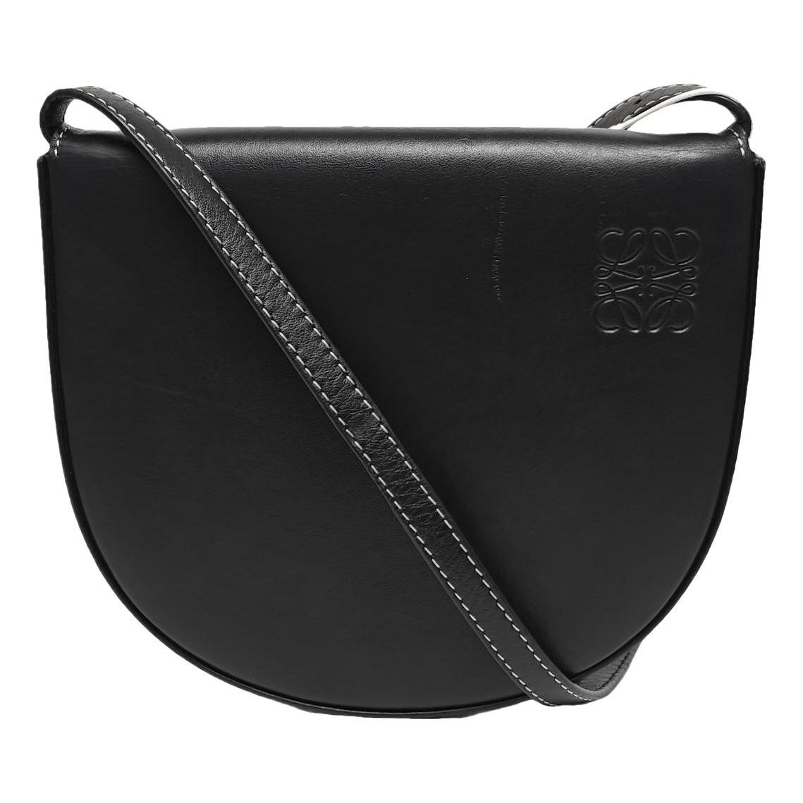 Heel leather handbag