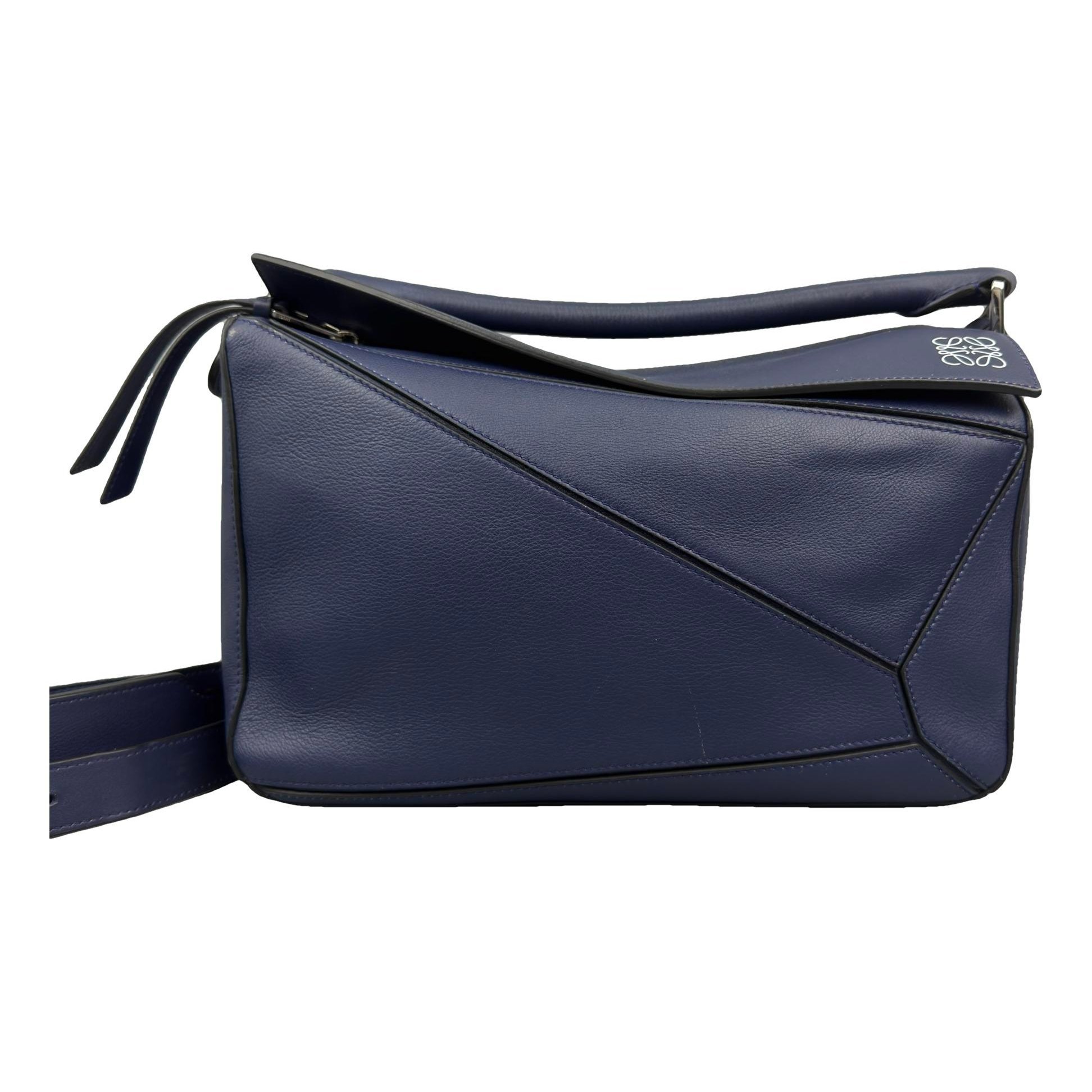 Puzzle leather handbag