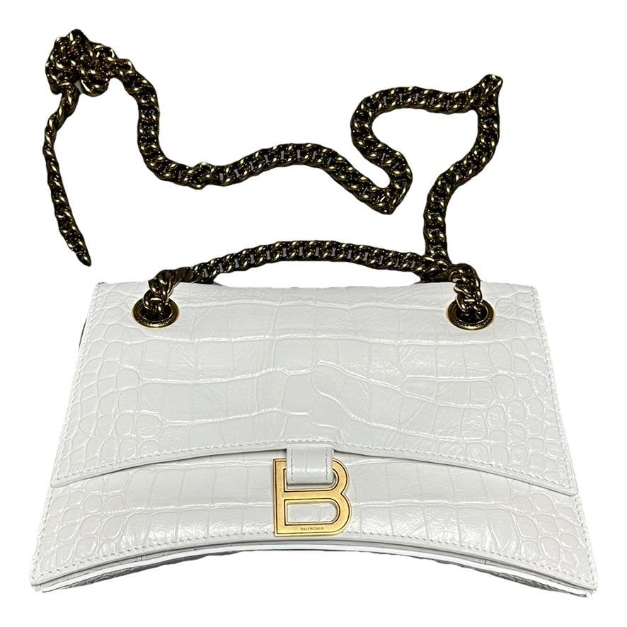 Crush patent leather handbag