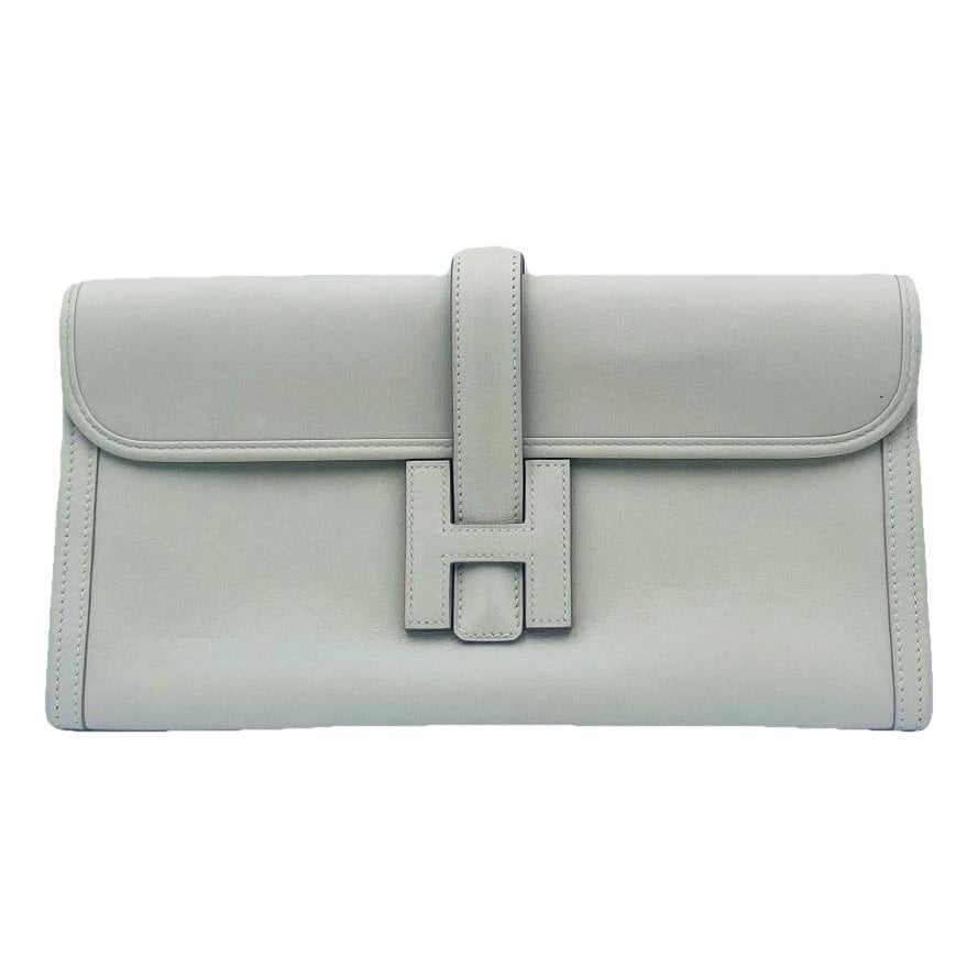 Jige leather clutch bag