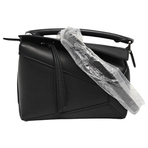 Puzzle leather handbag