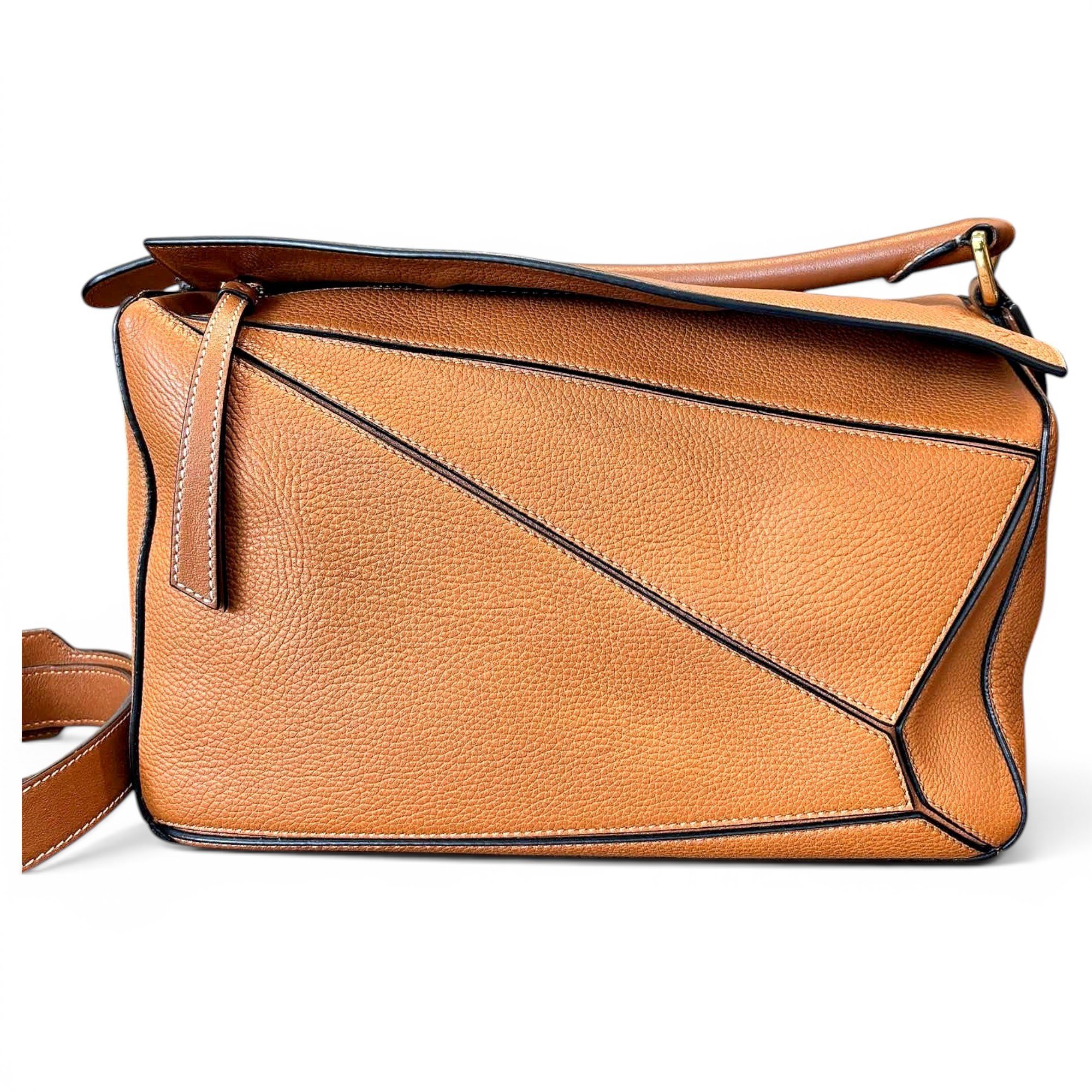 Puzzle leather handbag