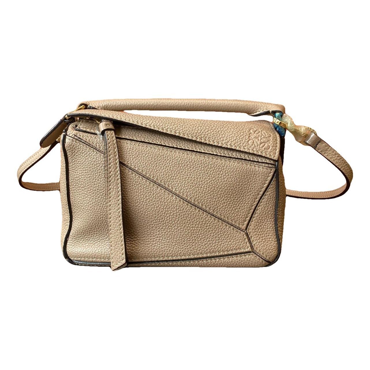 Puzzle leather handbag