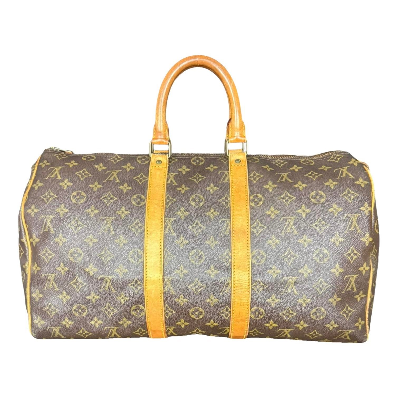 Louis Vuitton Keepall leather travel bag