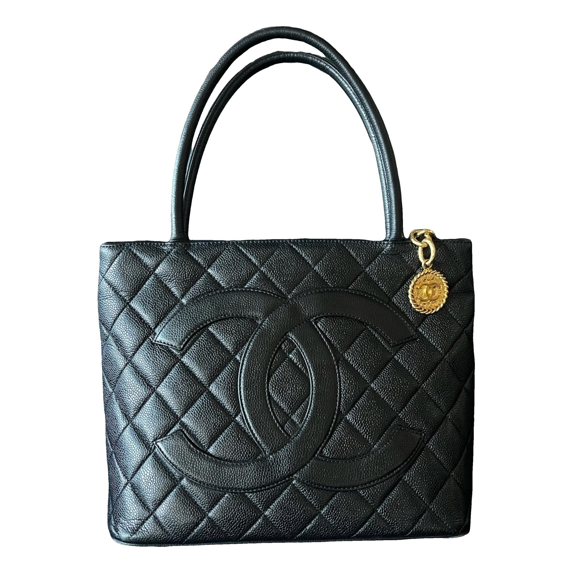 Médaillon leather handbag