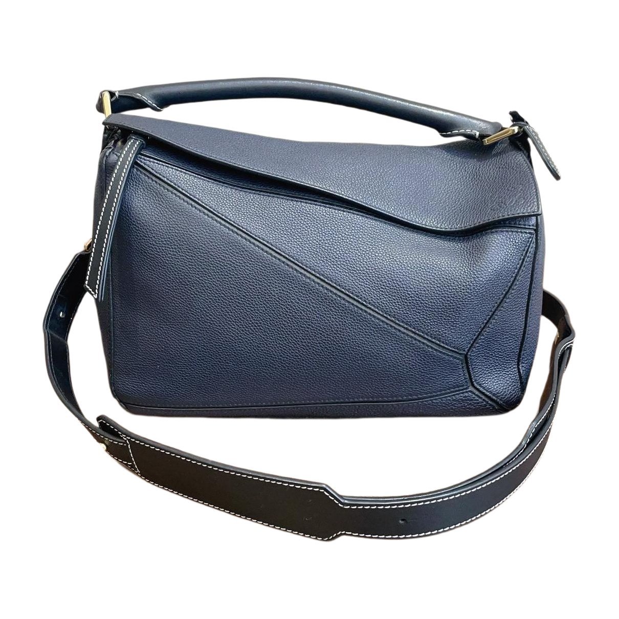 Puzzle leather crossbody bag