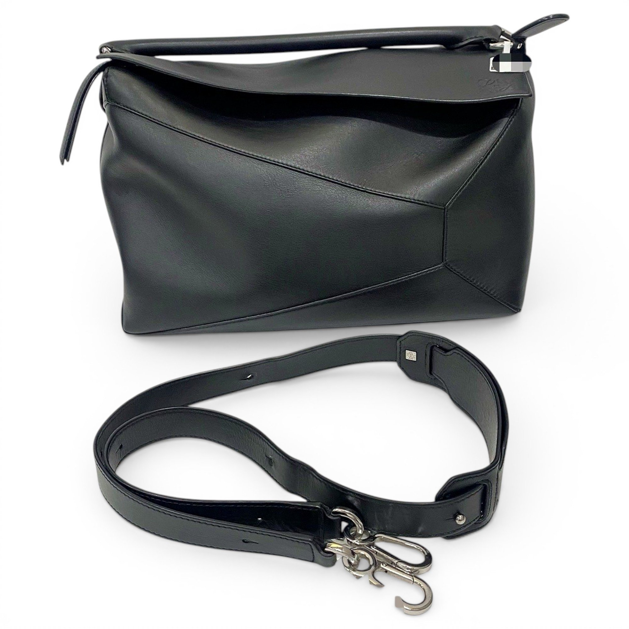 Puzzle leather handbag