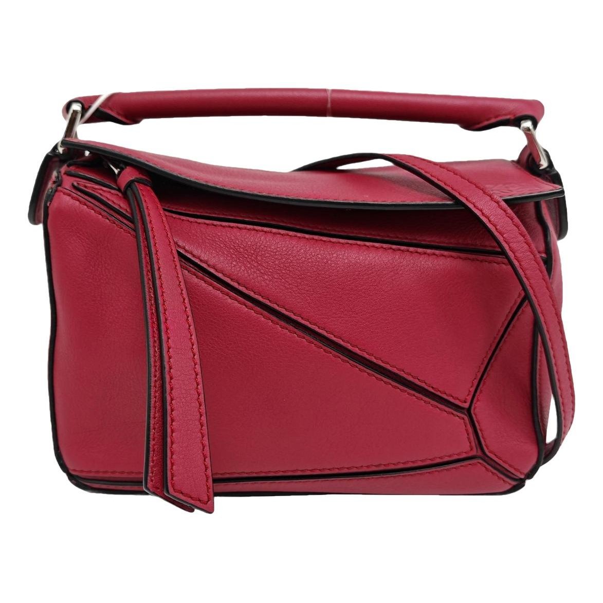 Puzzle leather handbag