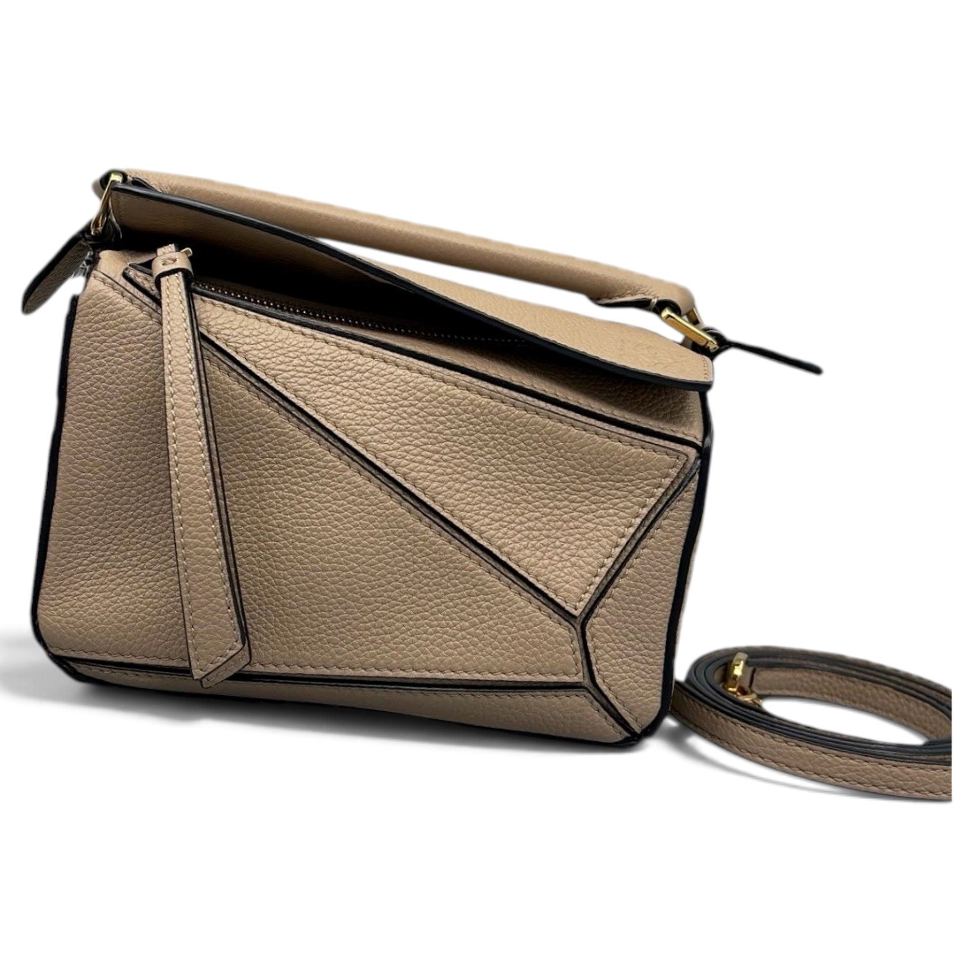 Puzzle leather handbag