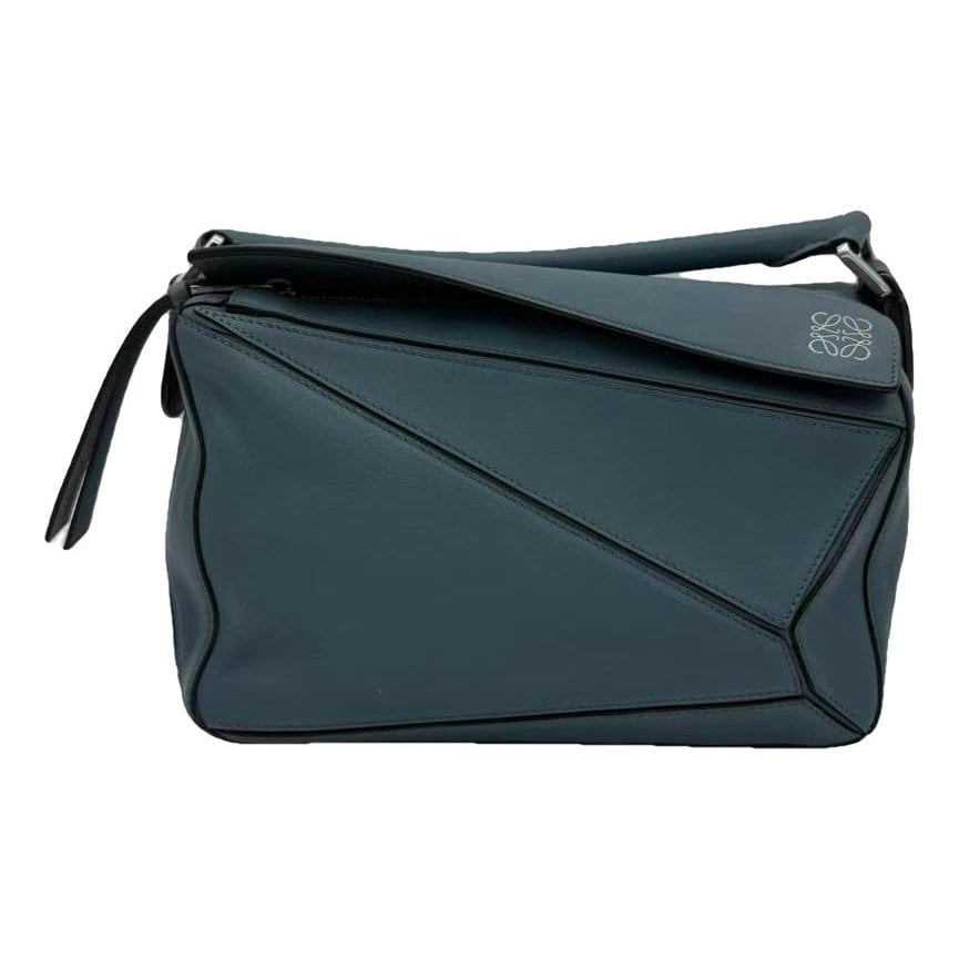 Puzzle leather handbag