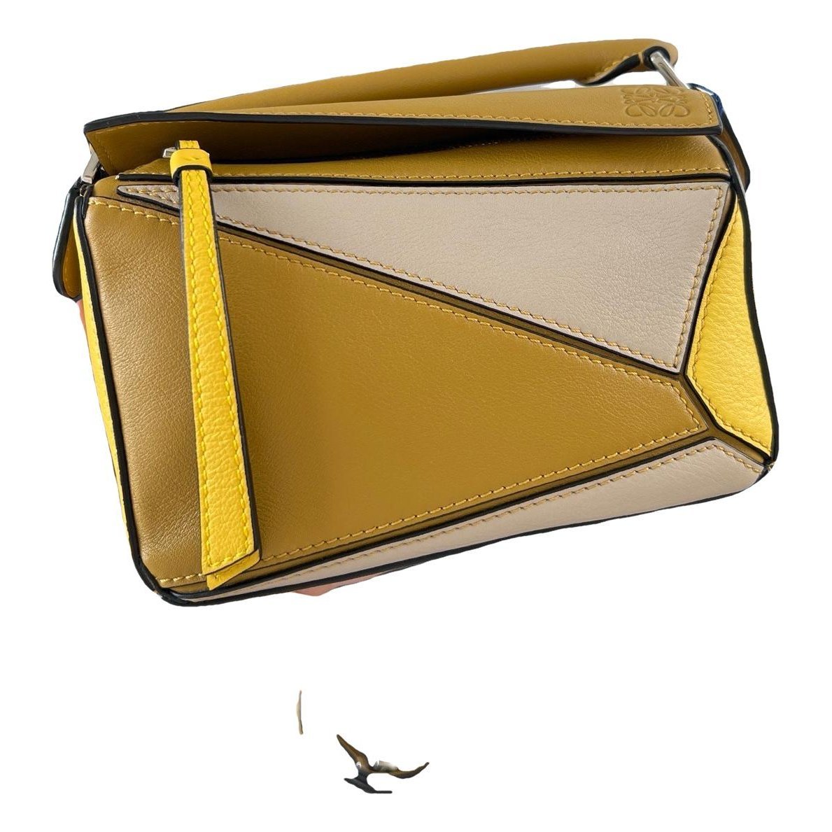 Puzzle leather handbag