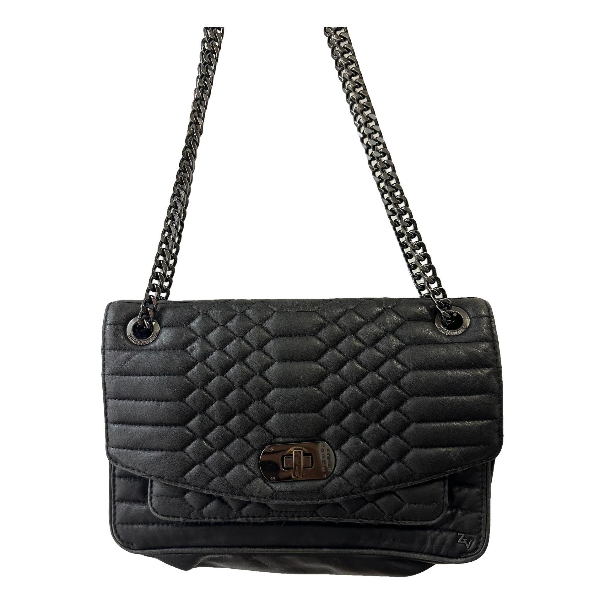 Rock leather clutch bag