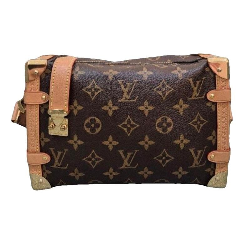 Side Trunk leather crossbody bag