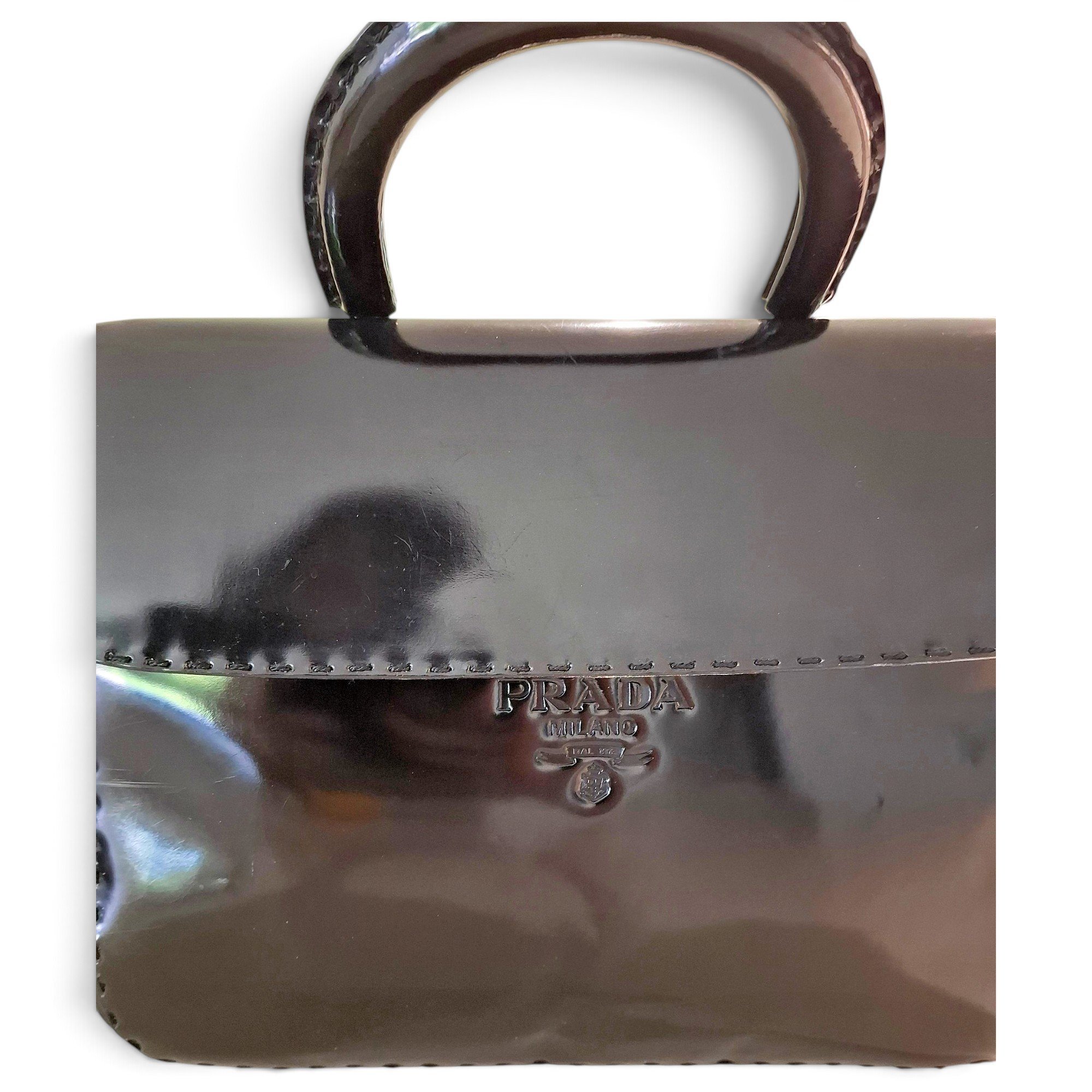 Pyramid patent leather handbag