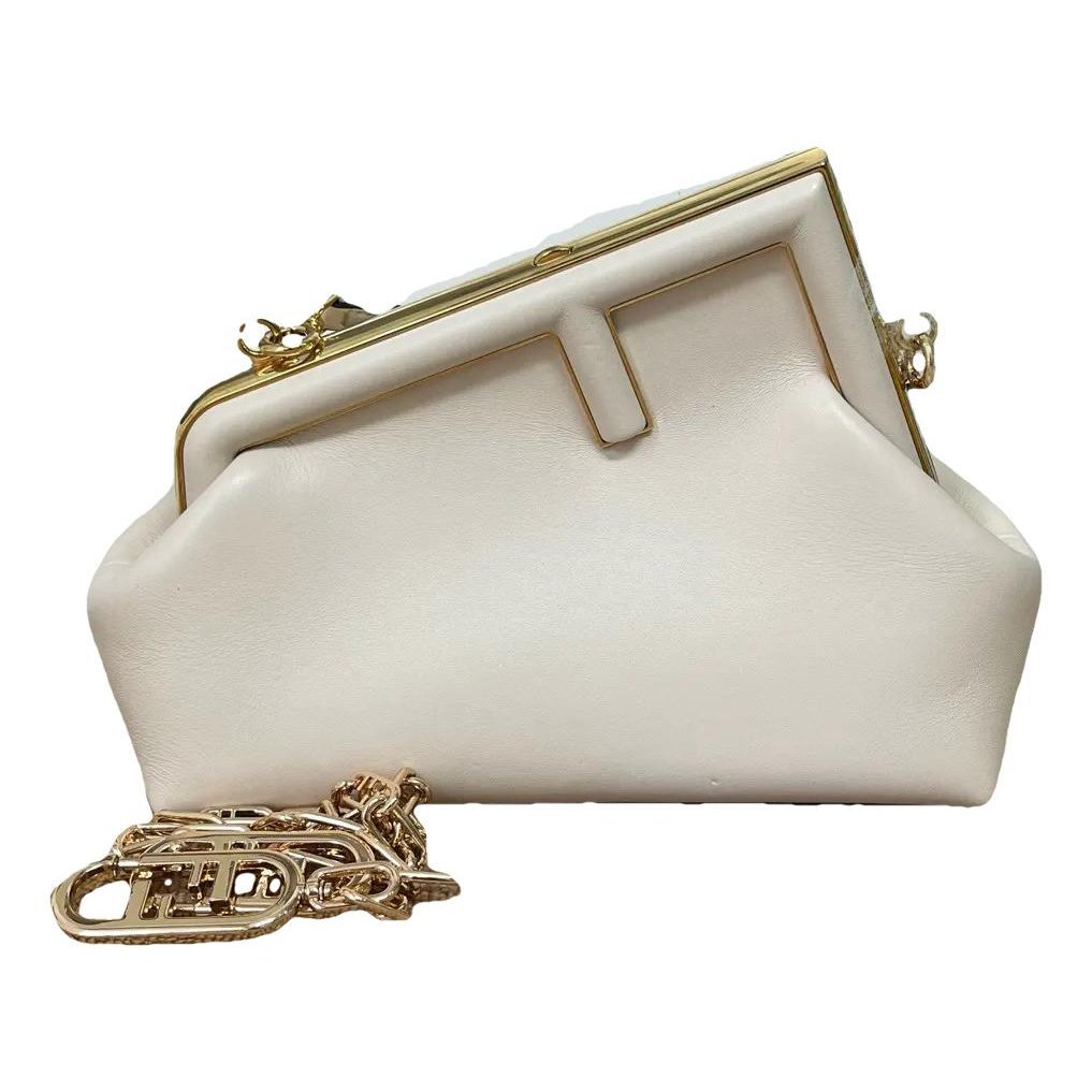 First leather handbag
