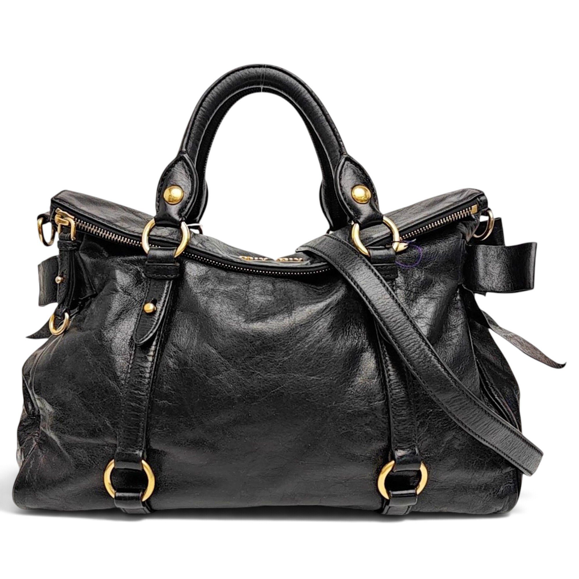 Bow bag leather handbag