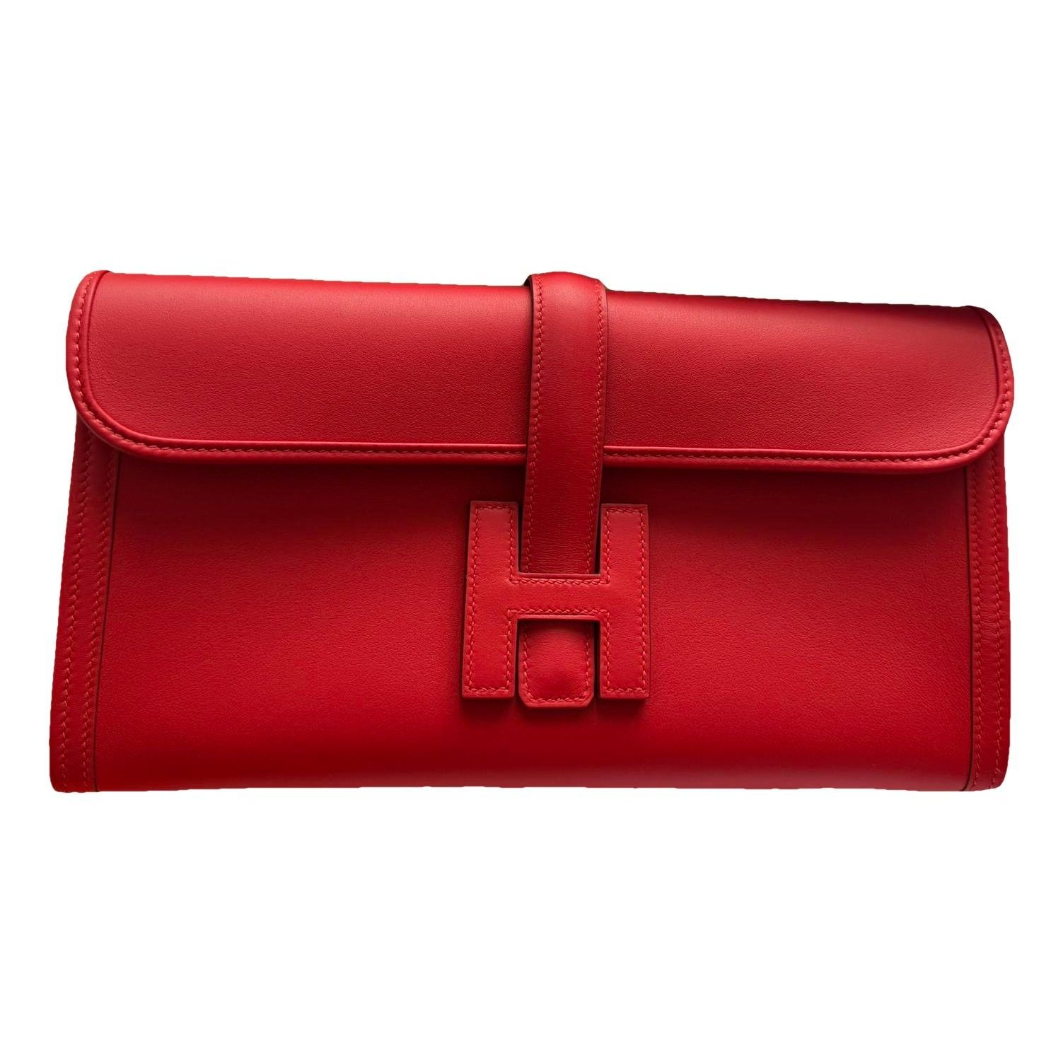 Jige leather clutch bag