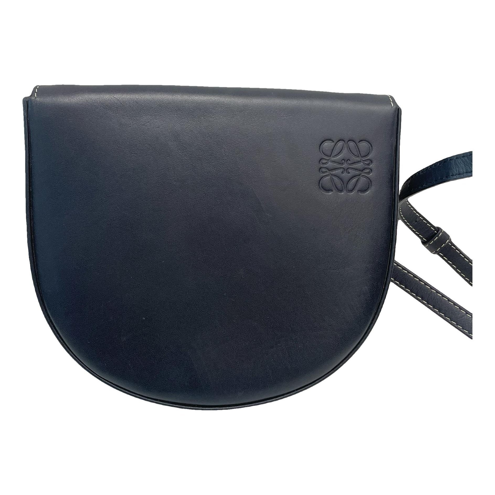 Heel leather handbag
