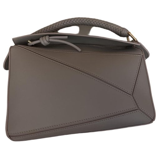 Puzzle leather handbag