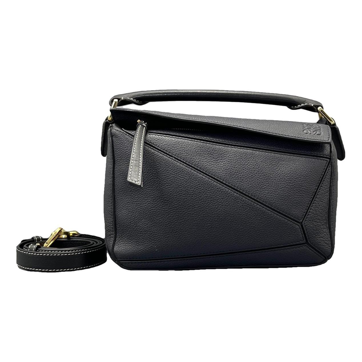 Puzzle leather handbag