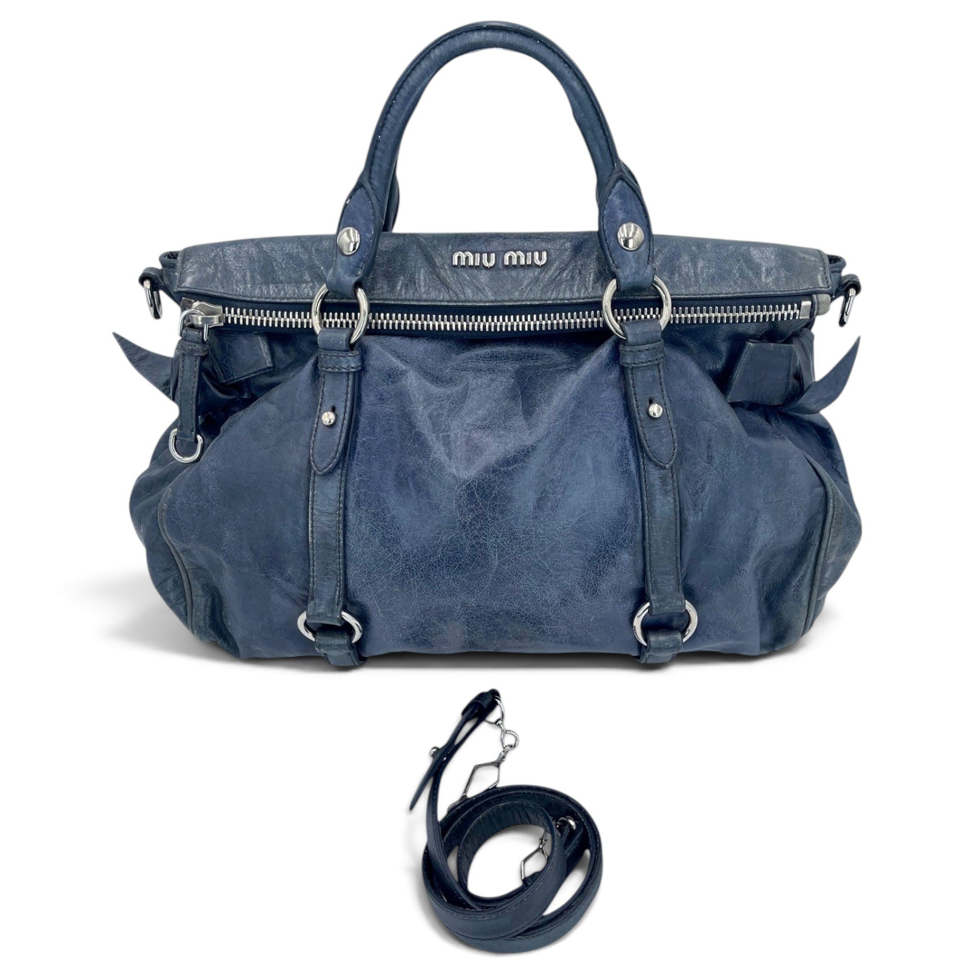 Bow bag leather handbag