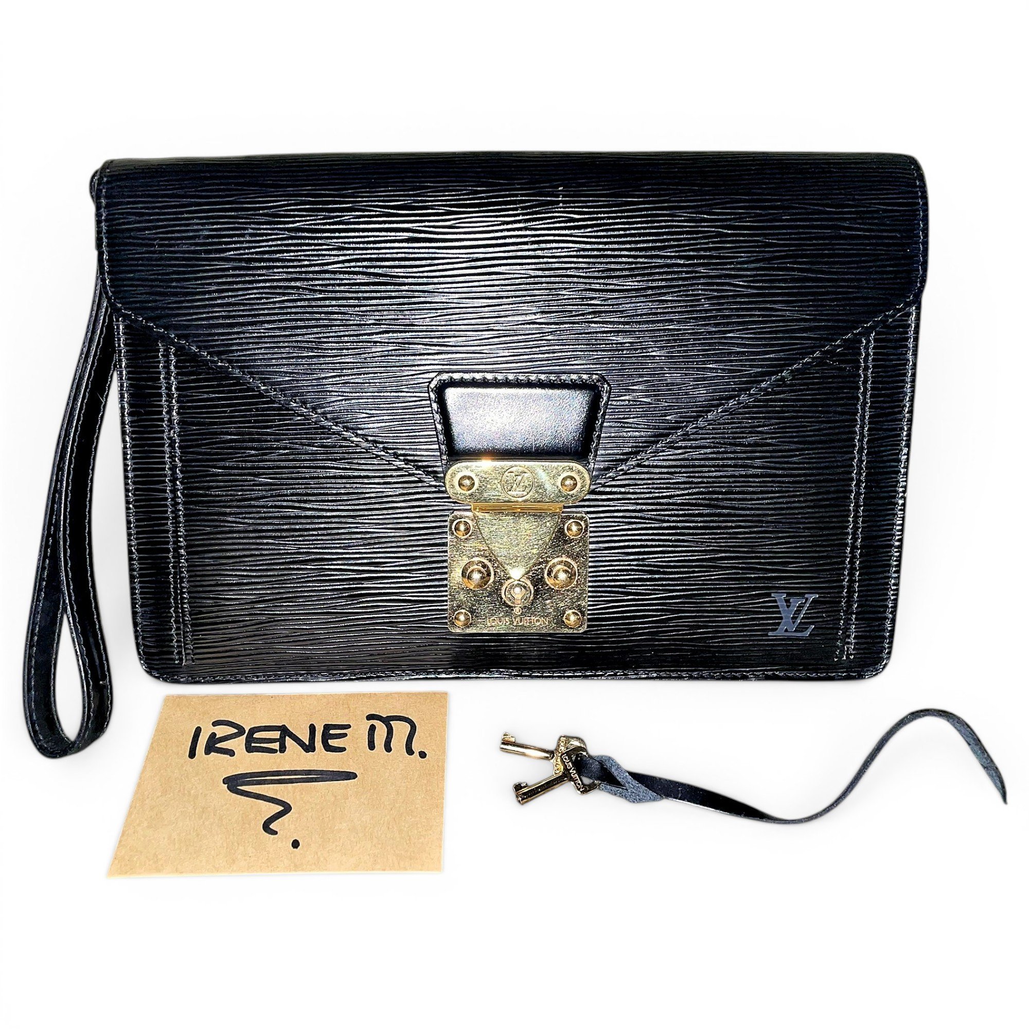 Sellier leather clutch bag